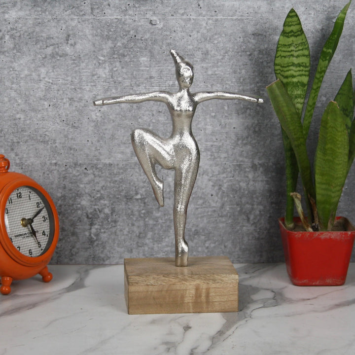 Dancing Lady Figurine with Sleek Wood Base
