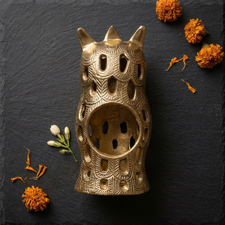 Premium owl candle holder with warm golden finish and detailed design