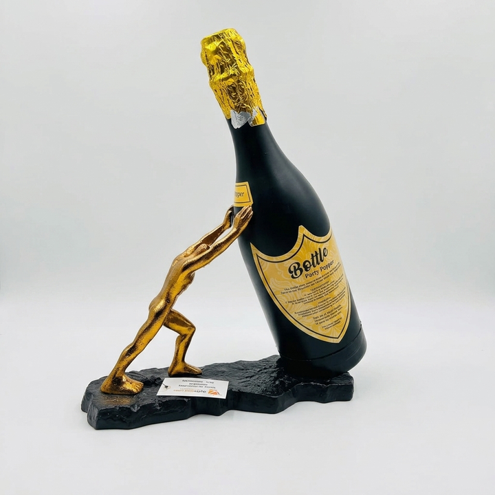 Man Holding Bottle Showpiece