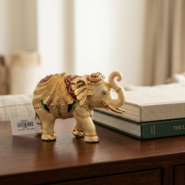 Ornate Luxury Elephant figurine with red green and gold decorative patterns