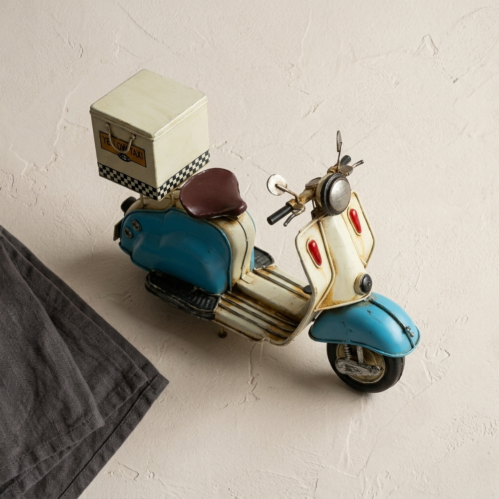 Vintage scooter showpiece for home decor in blue and cream