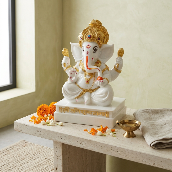 Premium White Ganesha Idol with intricate golden detailing