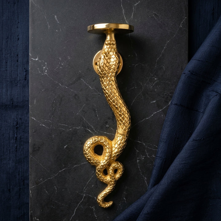 Designer Snake Wall Light creating ambient lighting in modern interiors
